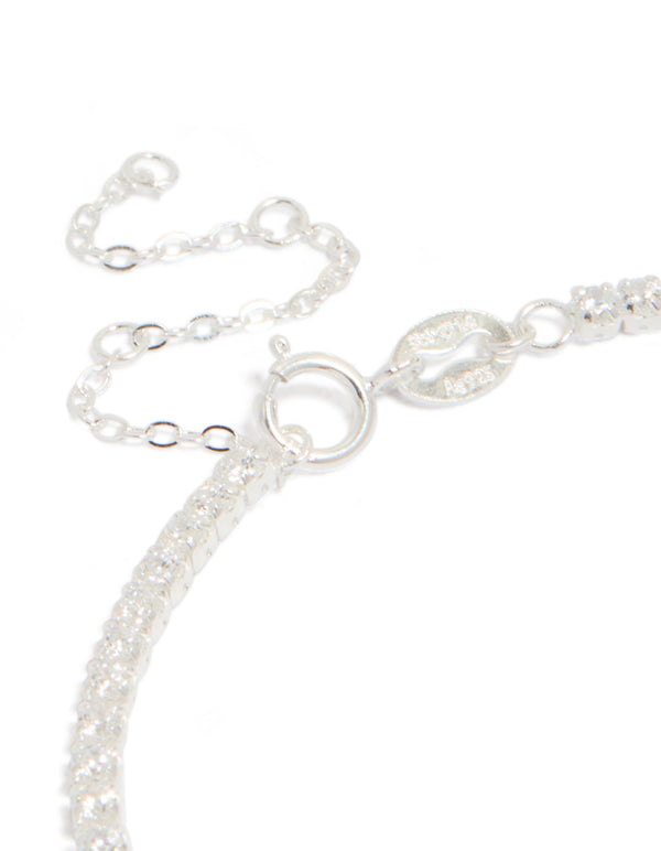 Stunning sterling silver tennis bracelet featuring cubic zirconia stones closure detail view