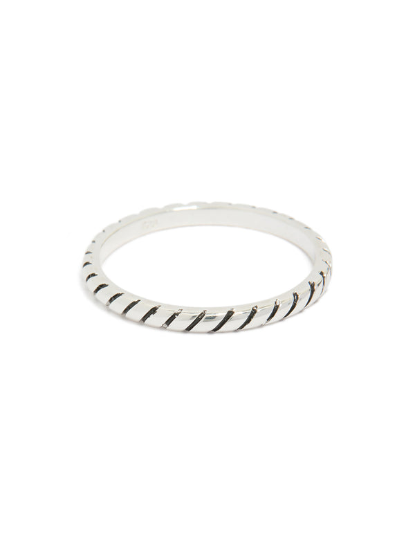 Featuring a textured black enamel ring in sterling silver with statement style front view