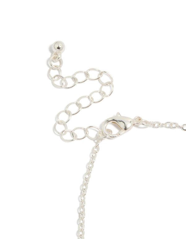 This silver plated cubic zirconia outline flower bracelet displays closure detail view