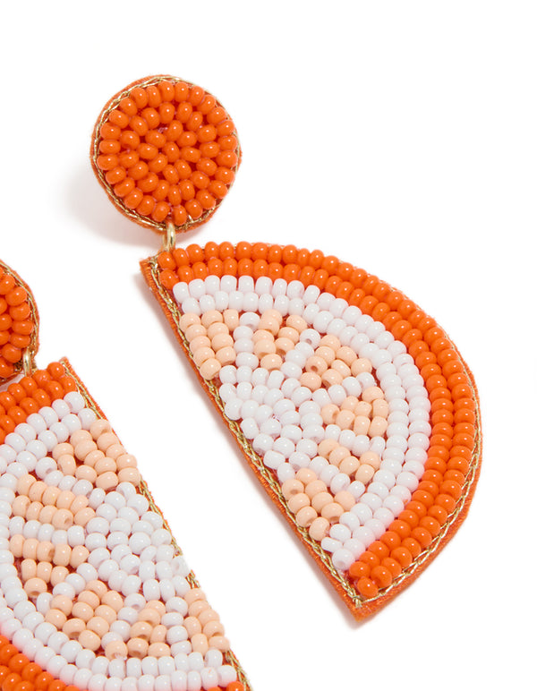 Designed with orange seed beads, these fruit drop earrings feature statement style in white, peachpuff, and gold post detail view