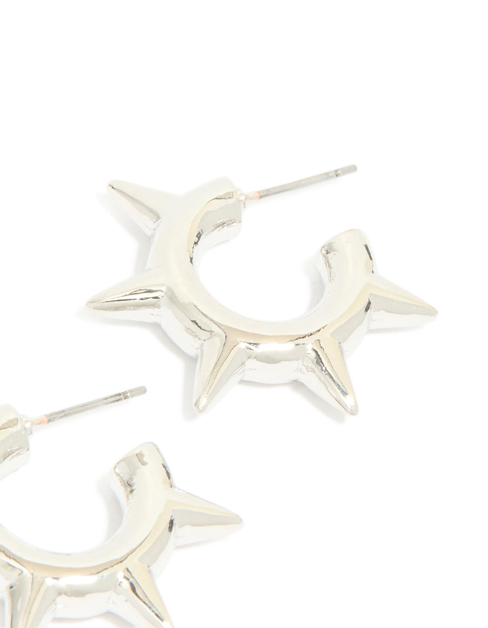 Designed with statement spike hoop earrings featuring silver finish and closure detail post detail view