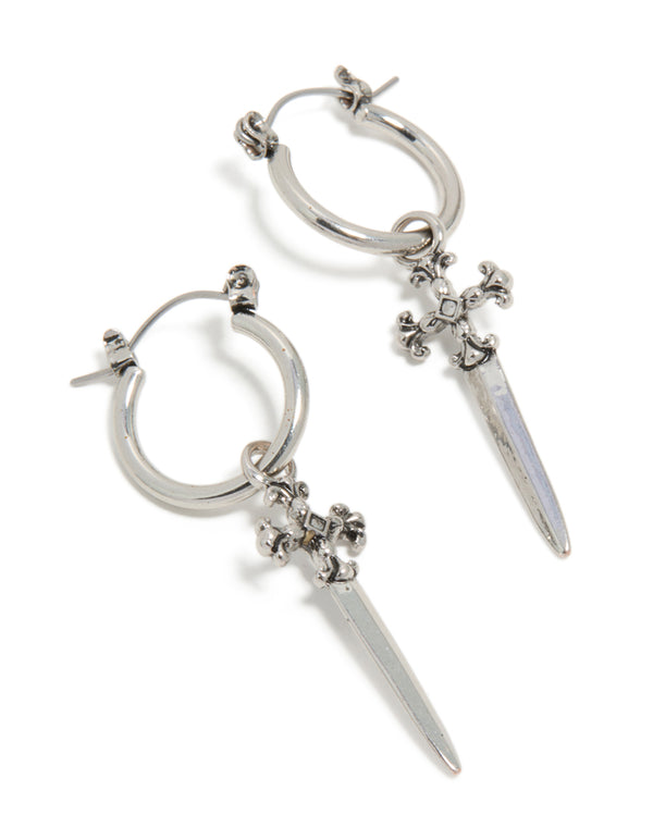 Presenting these silver dagger hoop earrings featuring statement style with cross details front view