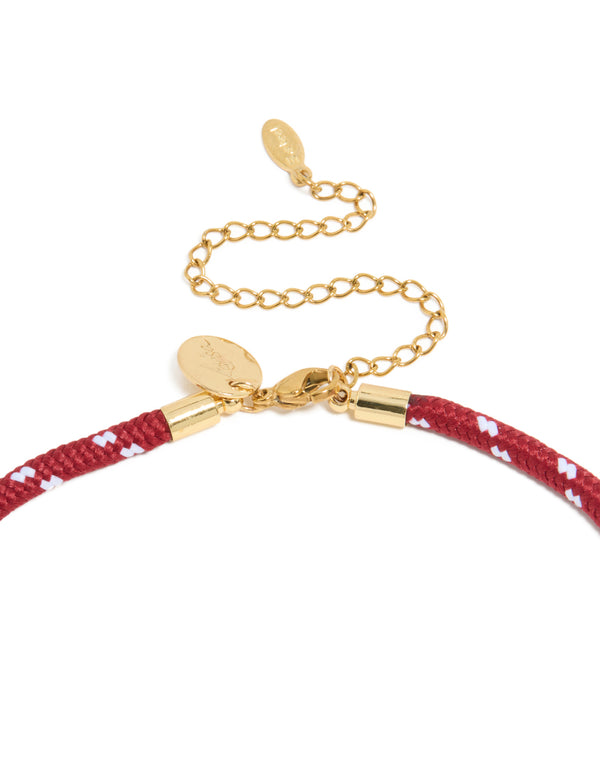 Crafted from waterproof gold plated stainless steel, this half tennis and half burgundy cord necklace accents in a statement style clasp detail view