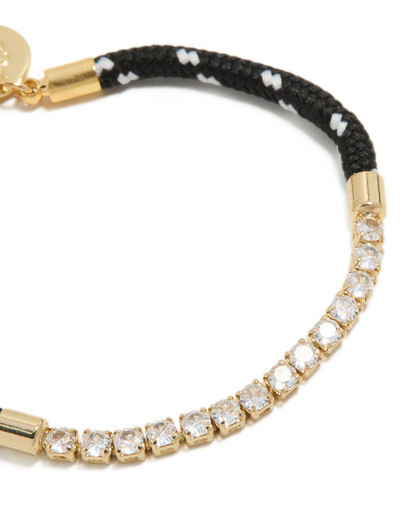 Crafted from waterproof gold plated stainless steel, this half tennis and black cord bracelet with cubic zirconia details in statement style close up view