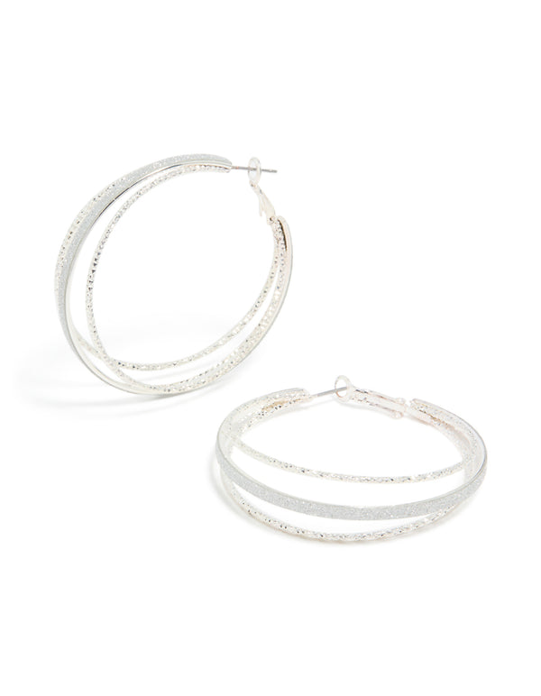 Stunning statement hoop earrings featuring textured split design with glitter in silver front view