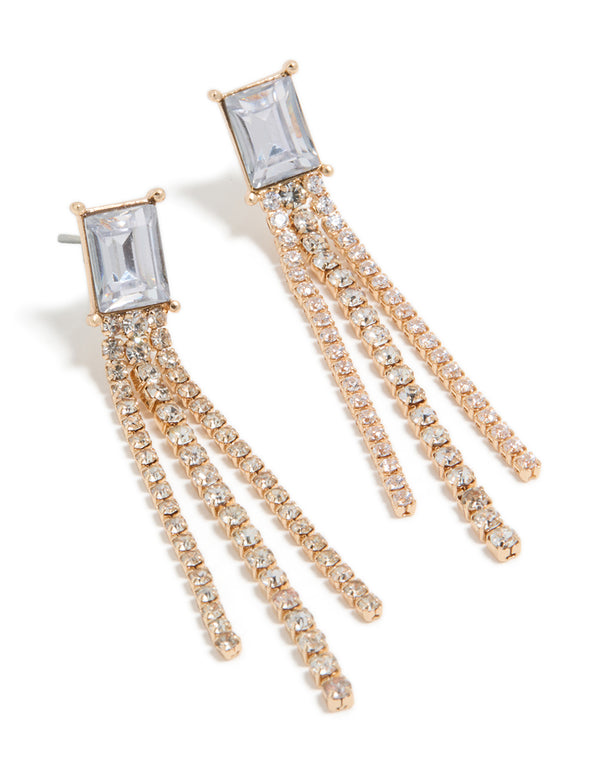 Showcasing gold diamante dangle earrings featuring tassel strands with clear gemstones front view