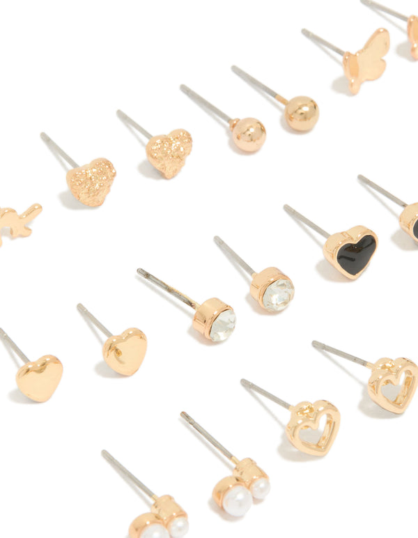 Explore this gold earrings 12-pack with pearl, butterfly, ball and heart stud closure in enamel close up view