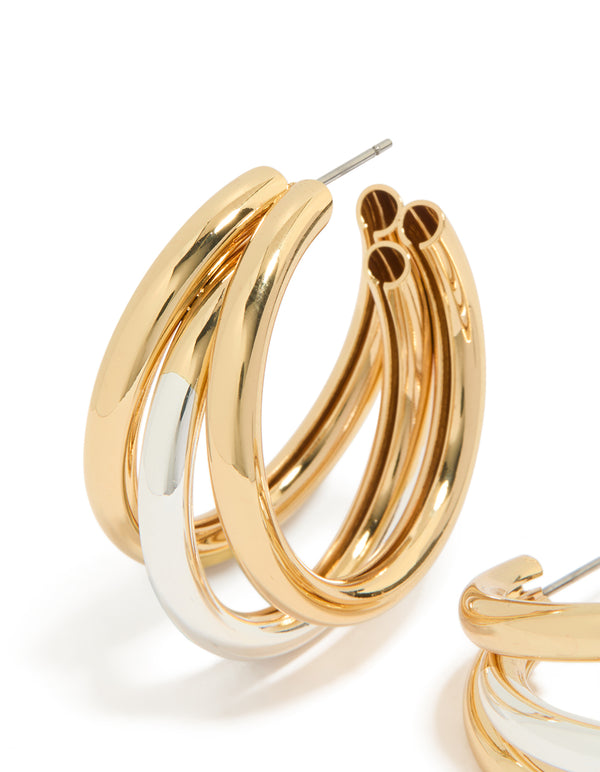 Featuring mixed metal plated large illusion hoop earrings crafted from gold and silver in dainty style close up view