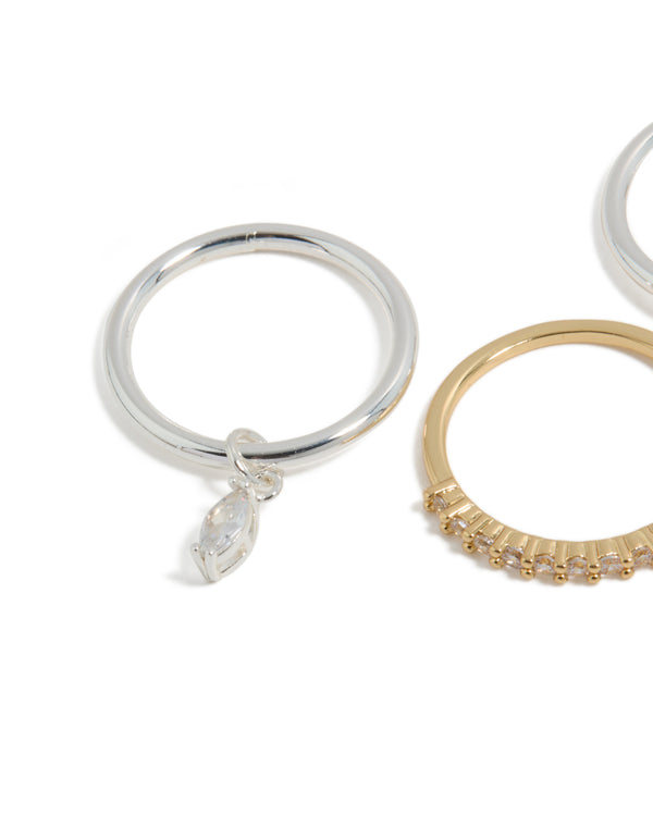 Featuring mixed metal plated organic cubic zirconia rings 4-pack with charm in gold and silver tones close up view
