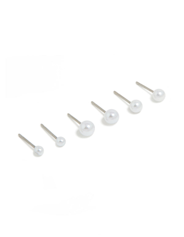 Featuring surgical steel graduating pearl stud earrings in white and silver with 3-pack front view