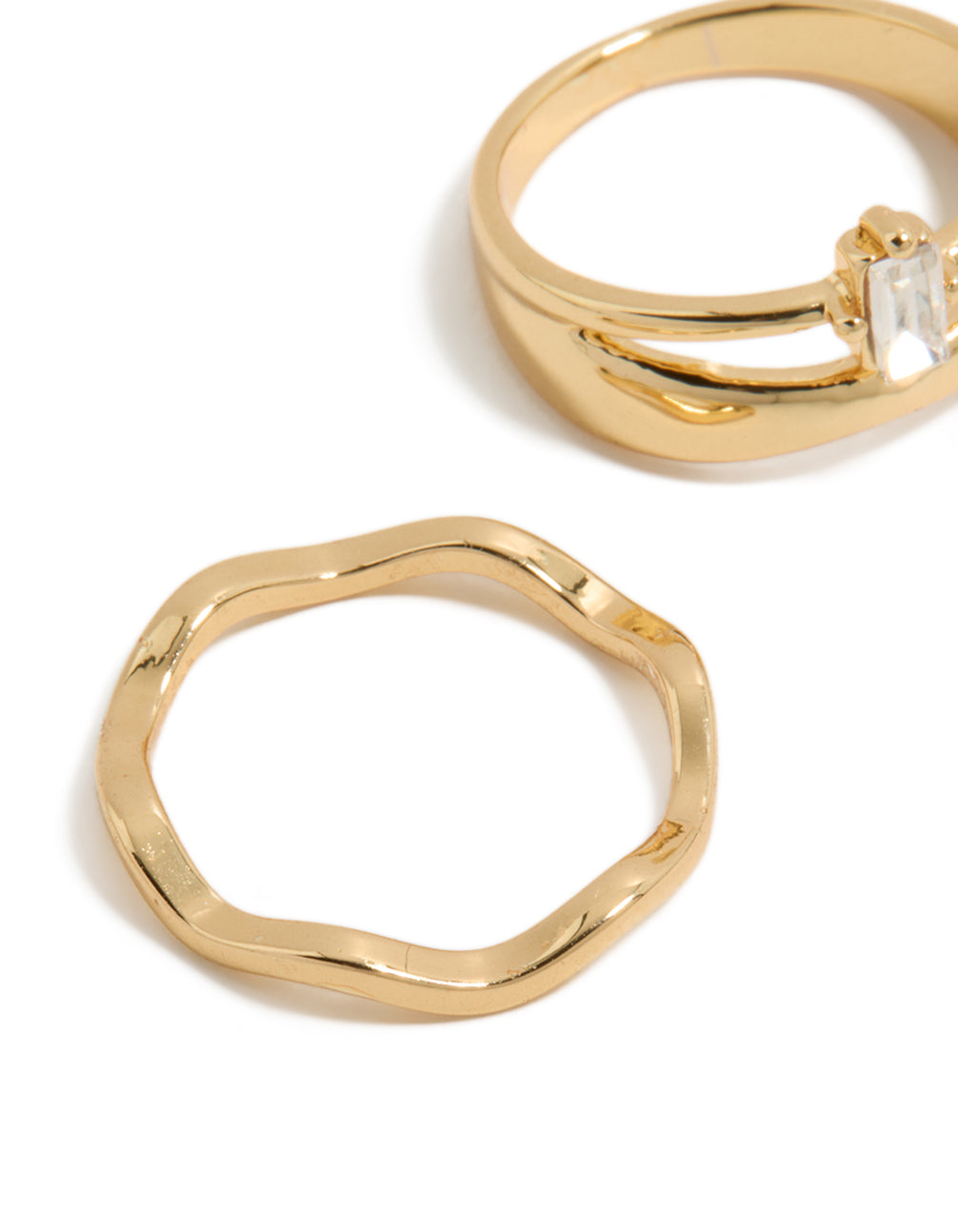 Featuring gold plated square and baguette cubic zirconia wavy rings 3-pack with statement and chunky design in crystal close up view