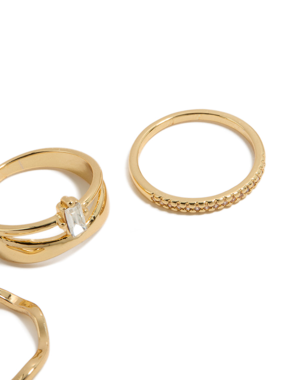 Showcasing gold plated square and baguette cubic zirconia wavy rings 3-pack in statement and chunky style with crystal embellishments side detail view