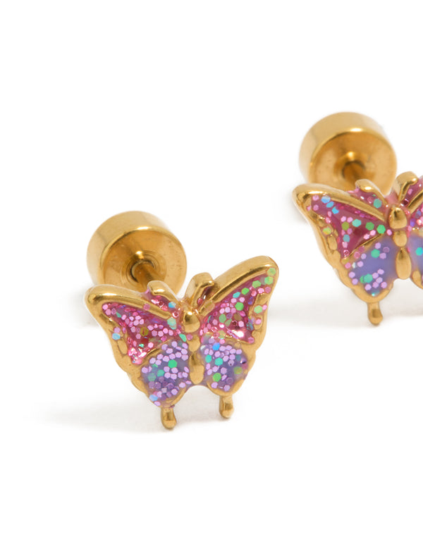 Showcasing gold plated surgical steel flower flat back studs with butterfly and glitter details close up view