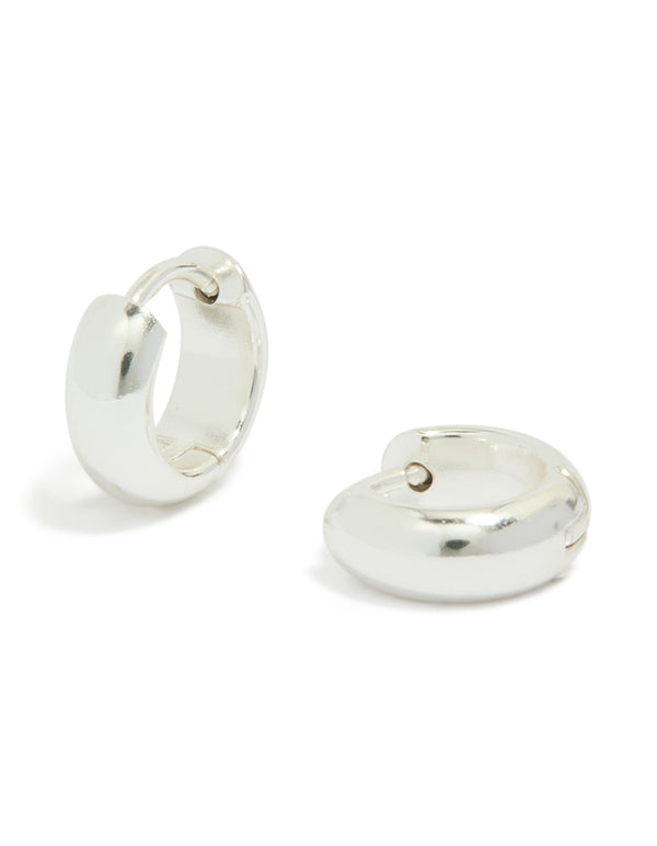 Showcasing chunky waterproof huggie hoop earrings crafted from silver plated stainless steel front view