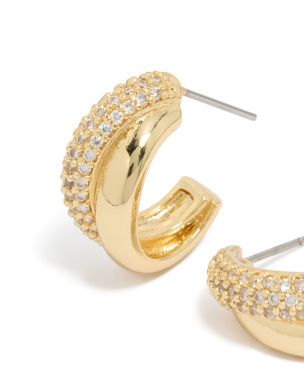 Featuring gold plated cubic zirconia pavé and plain layered hoop earrings with crystal details close up view