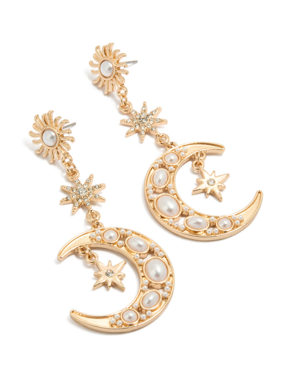 Beautifully crafted gold pearl celestial drop earrings featuring charm details front view