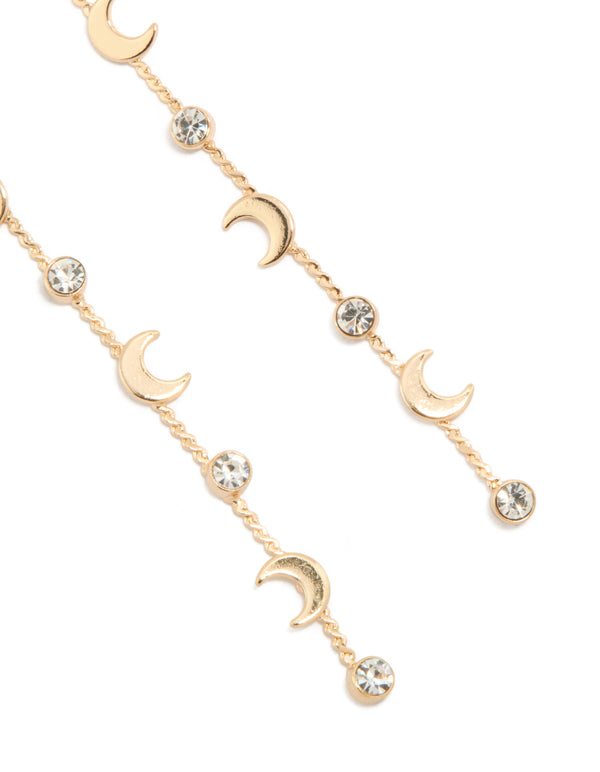 Highlighting gold clear diamante and celestial charm thin drop earrings post detail view
