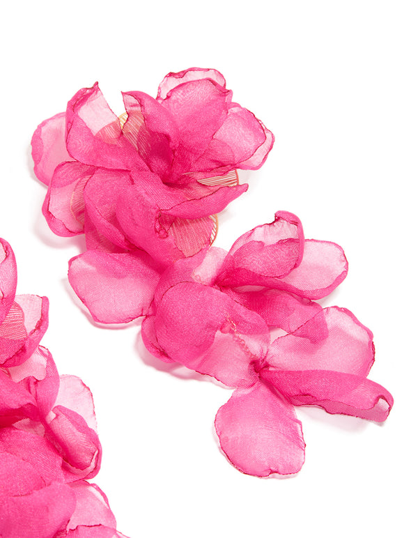 Hot pink fabric flower drop earrings with statement design post detail view