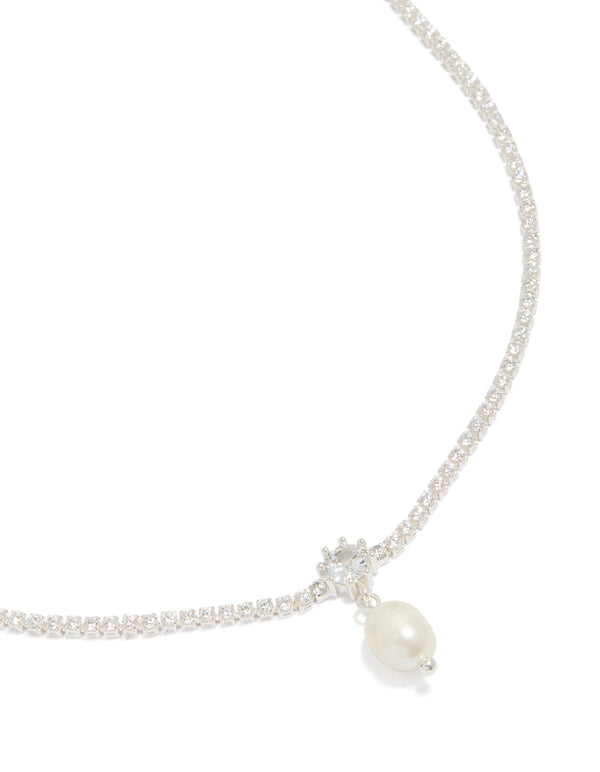 Beautifully crafted silver plated cubic zirconia and freshwater pearl tennis necklace with close up view