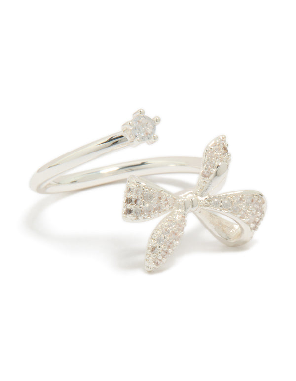Showcasing a silver plated cubic zirconia dainty wrap bow ring front view