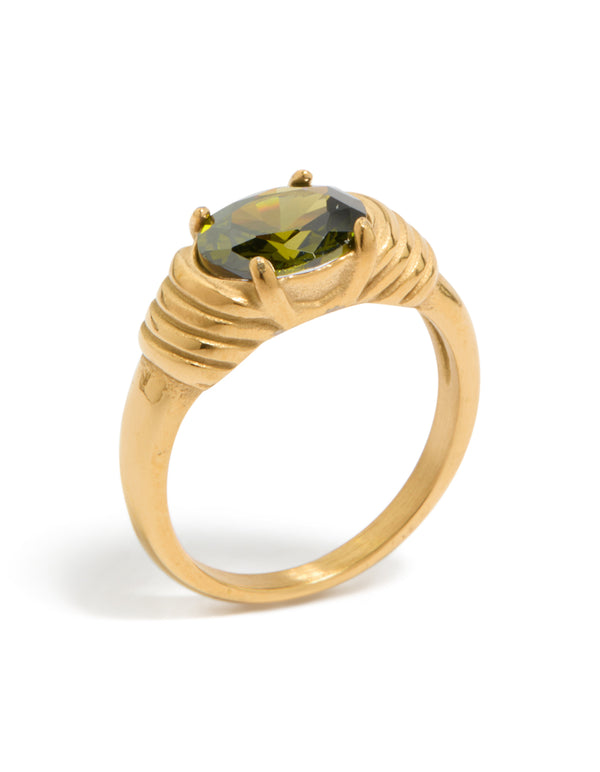 Featuring a waterproof gold plated stainless steel ring with oval green cubic zirconia in a chunky style front view