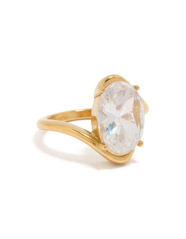 Showcasing a waterproof statement ring crafted from stainless steel with oval cut crystal and cubic zirconia in gold plated finish front view