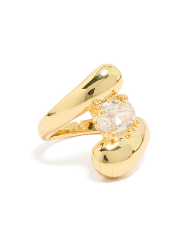 Crafted from gold plated metal with cubic zirconia in a statement puffy wrap ring design front view