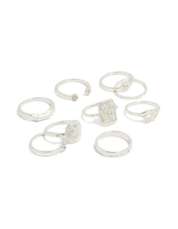 Showcasing a statement ring 9-pack featuring roman numeral and diamante details in silver front view