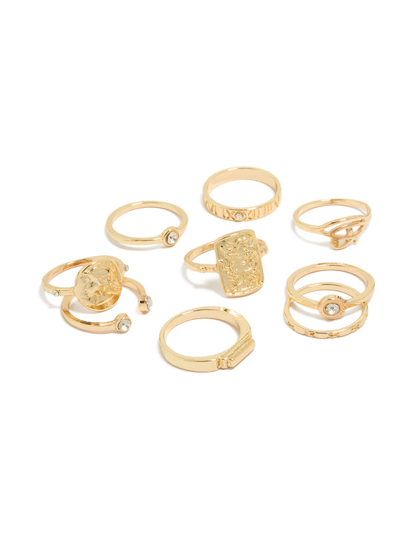 Showcasing gold Roman numeral and diamante rings in a dainty 9-pack disc details front view