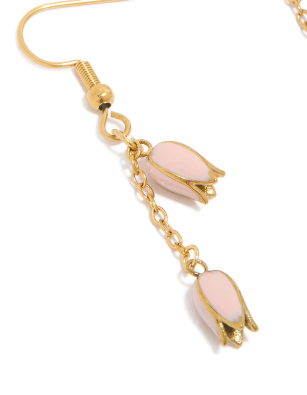 Detailed view of waterproof gold plated stainless steel pink tulips drop earrings with floral pattern close up view