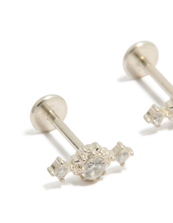 Featuring waterproof stainless steel textured cubic zirconia trio flat back studs in silver and clear close up view