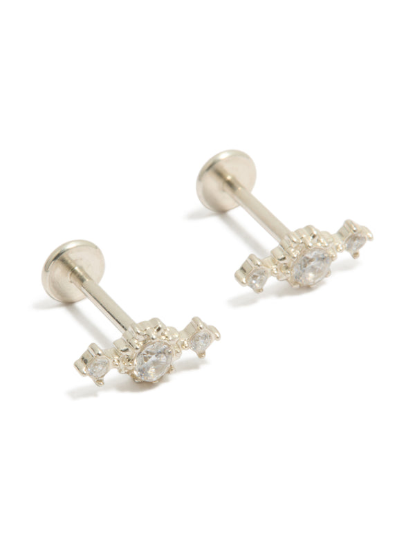 Showcasing waterproof textured trio flat back studs crafted from stainless steel featuring cubic zirconia in silver and clear front view