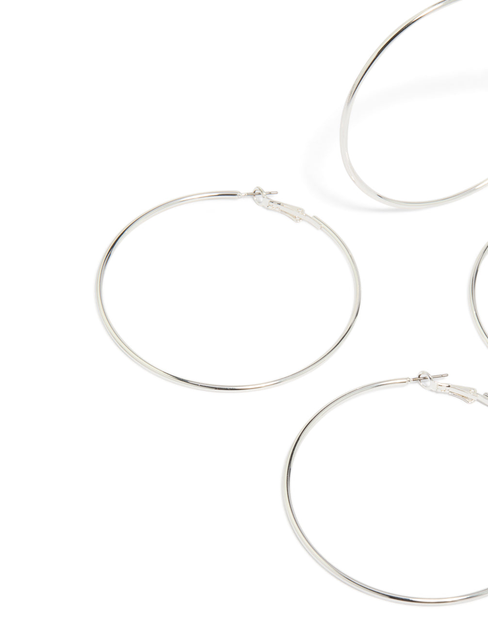 Featuring silver large hoop earrings in a 2-pack and classic closure close up view