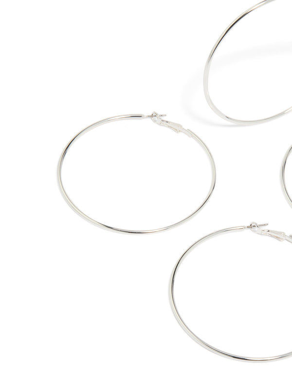 Featuring silver large hoop earrings in a 2-pack and classic closure close up view