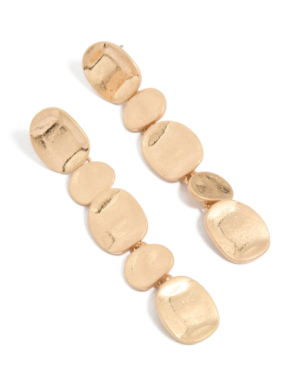 Showcasing statement drop earrings in gold with cascading circle design front view