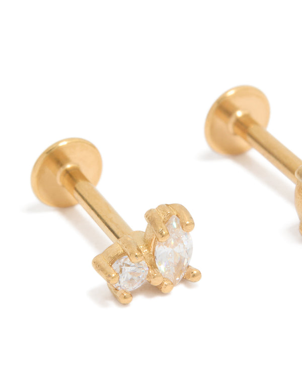 Featuring gold plated surgical steel oval and circle cubic cluster zirconia flat back studs with clear stones close up view