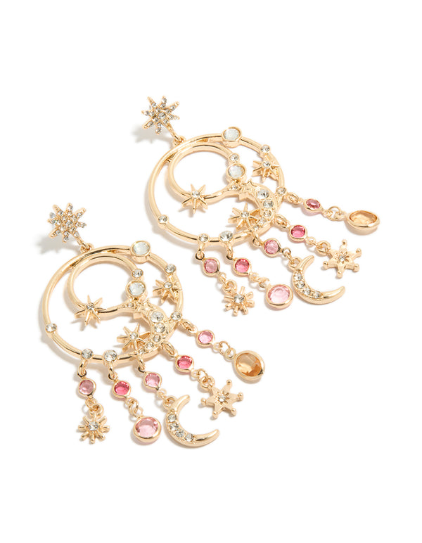 Showcasing statement circle drop earrings featuring celestial charm designs with stars in stud closure, gold, pink and clear diamantes front view