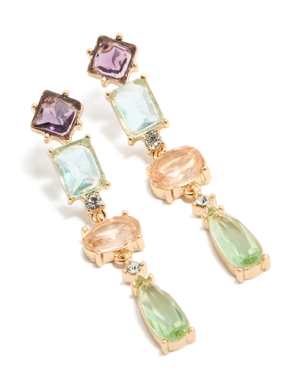 Showcasing gold irregular shaped purple and blue diamantes drop earrings with oval stone cut in a statement style front view