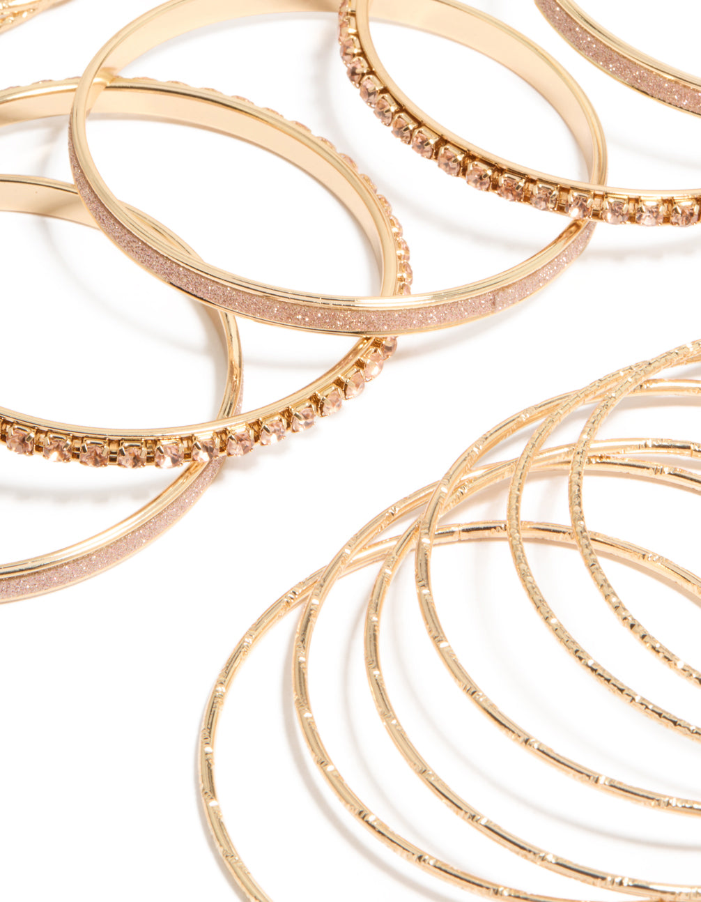 Showcasing gold pink diamante bangles in a stackable 21-pack, close up view
