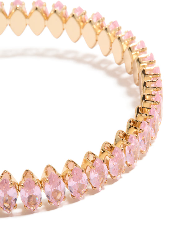 Featuring a gold pink diamante bracelet with light pink stones close up view