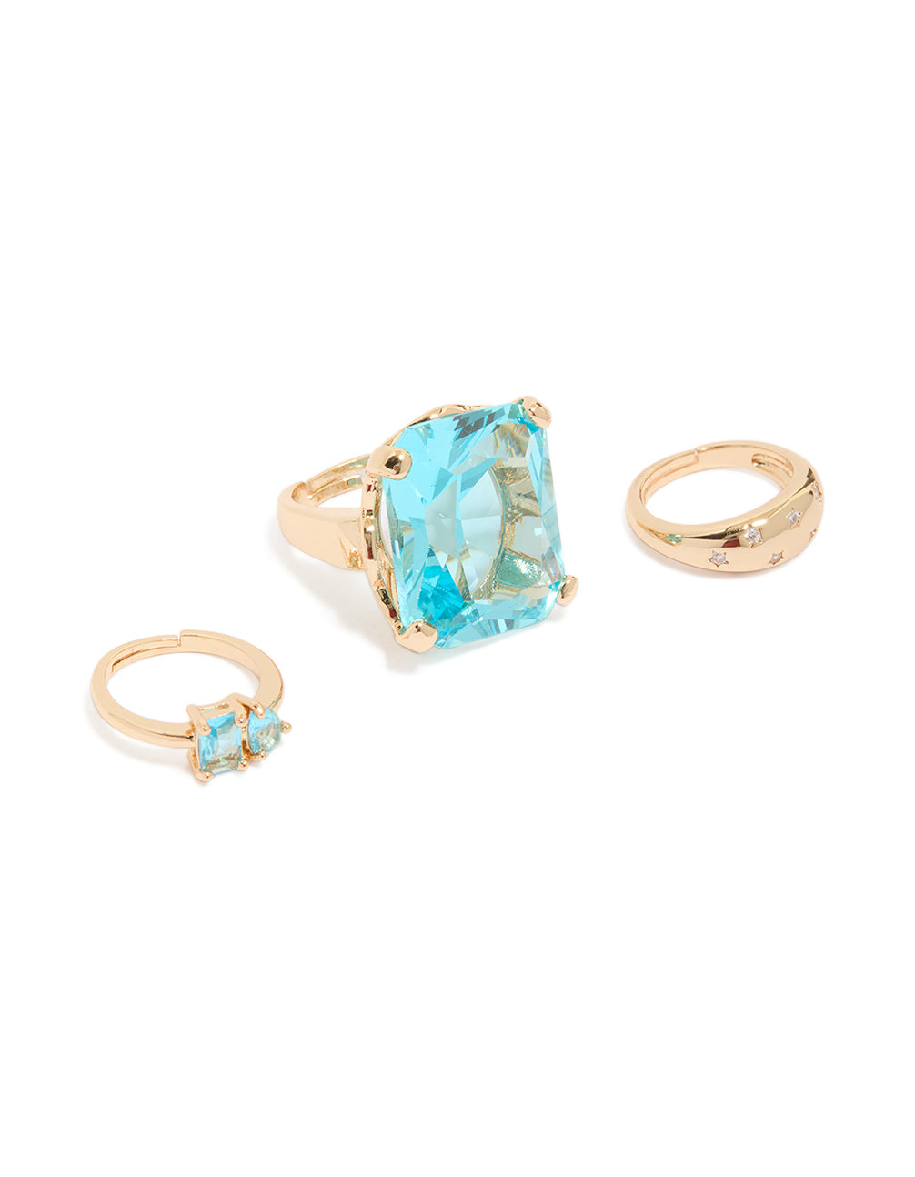 Showcasing a gold statement ring set with oval cut aqua diamante stones front view