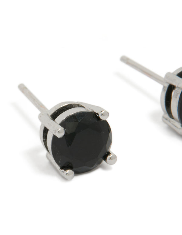 Detailed view of mens round cut stud earrings with black cubic zirconia in waterproof stainless steel and silver close up view