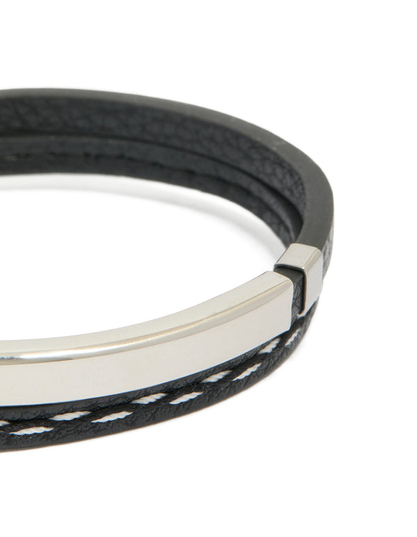 This bar bracelet highlights cord, PU leather, and stainless steel construction in waterproof black and silver close up view