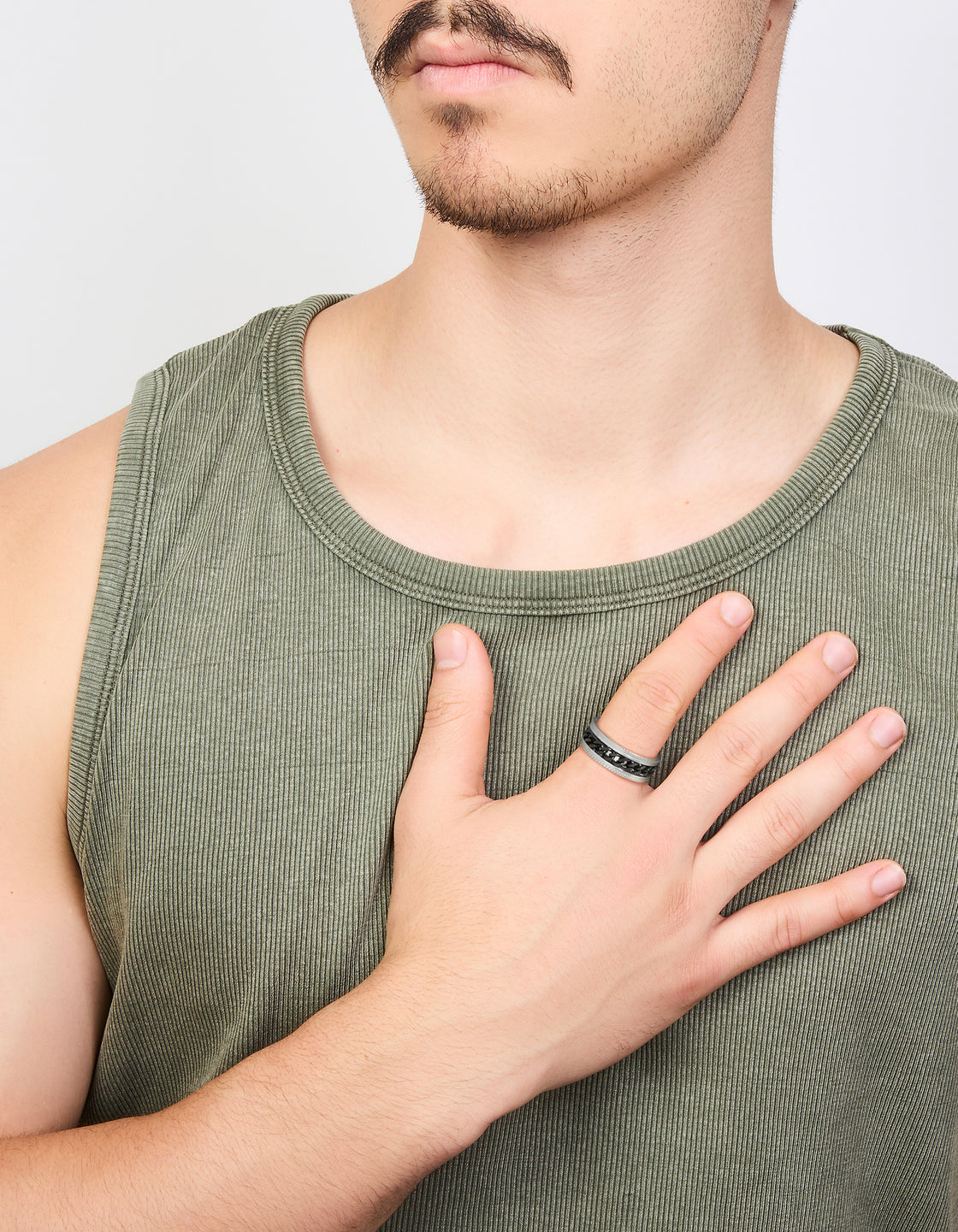 Crafted from waterproof stainless steel, this mens black chain detail band ring in silver on finger view