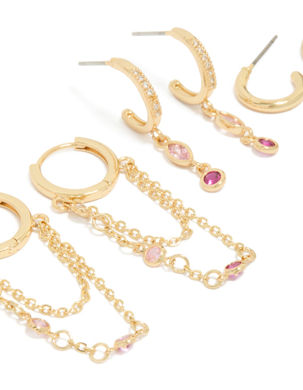 Explore gold plated dark pink cubic zirconia stacker earrings 4-pack featuring crystal embellishments huggie and stud closures in hot pink and light pink close up view
