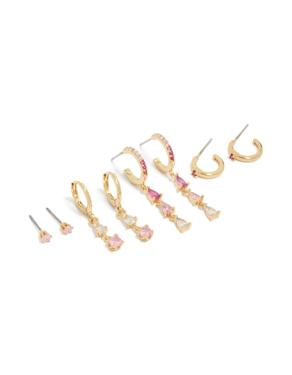 Elegant gold plated stacker earrings 4-pack featuring clear and light pink cubic zirconia crystals with huggie closures front view