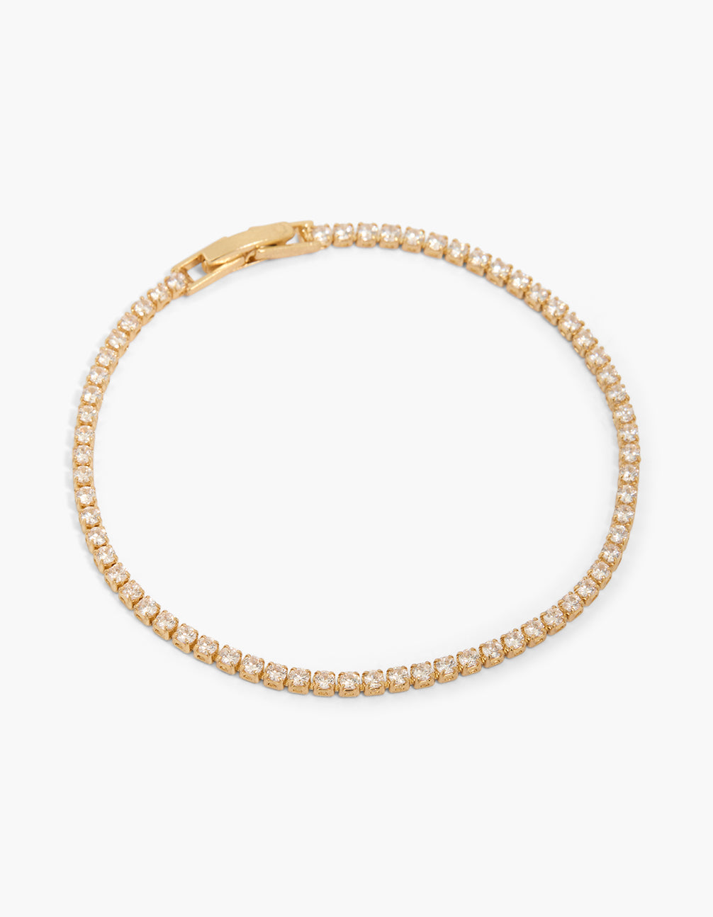Discover this small round cubic zirconia tennis bracelet crafted from gold plated material front view