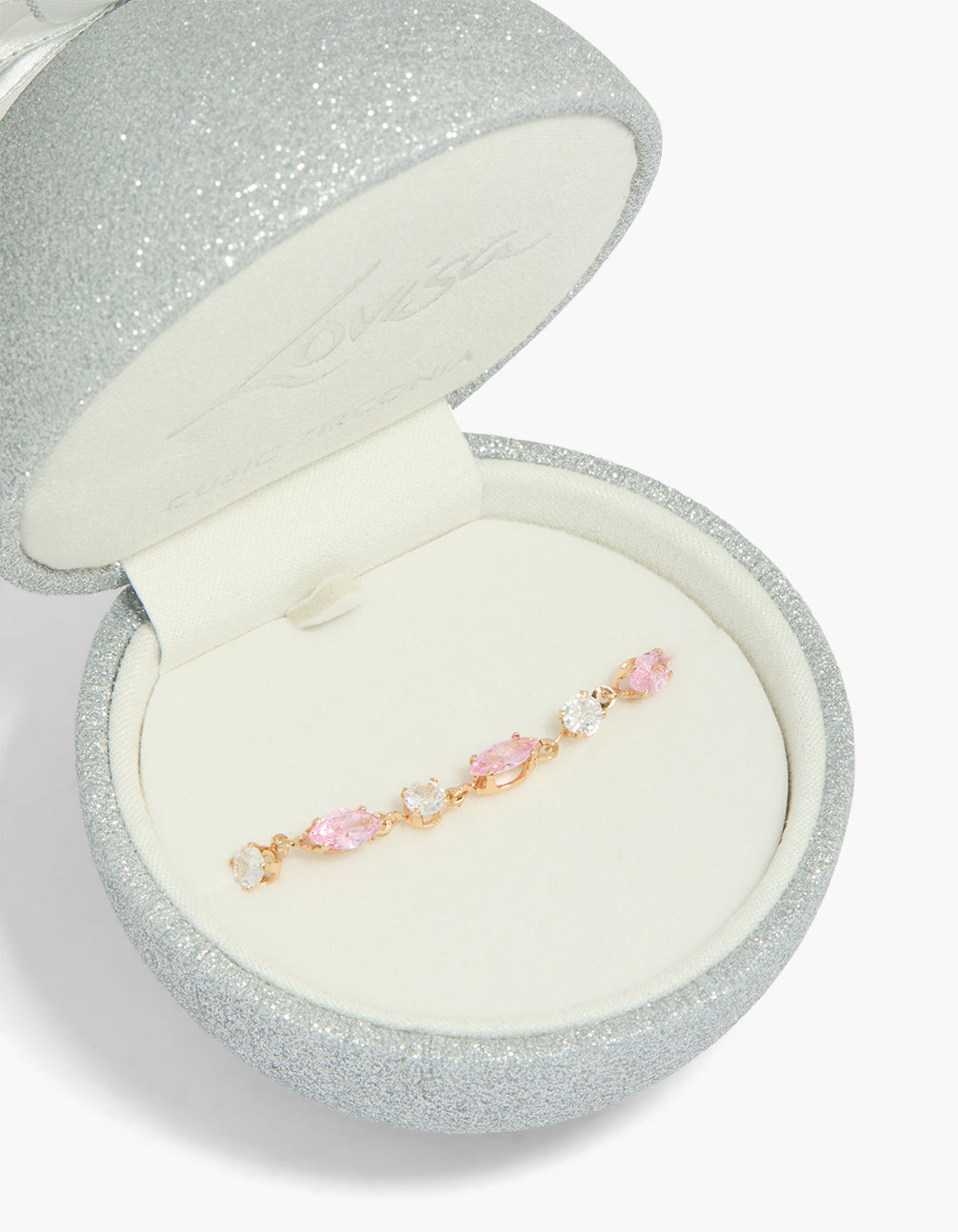 Showcasing a Gold Pink Cubic Zirconia Oval & Circle Bracelet with clear stones crafted from cubic zirconia featuring oval stone cut close up view