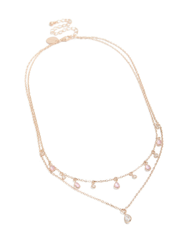 Beautifully designed layered necklace with charm featuring pear stone pink and clear cubic zirconia in rose gold plated finish front view