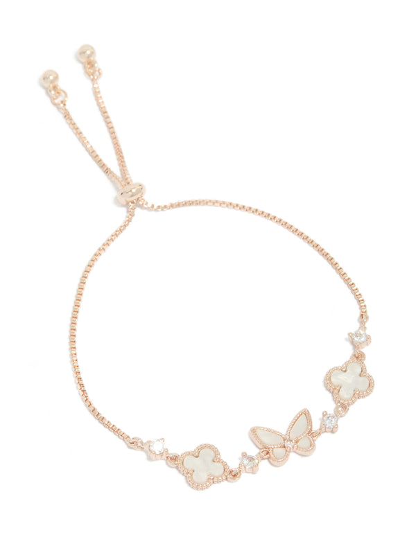 Showcasing a rose gold plated cubic zirconia alternating flower and butterfly charm toggle bracelet in ivory and clear front view